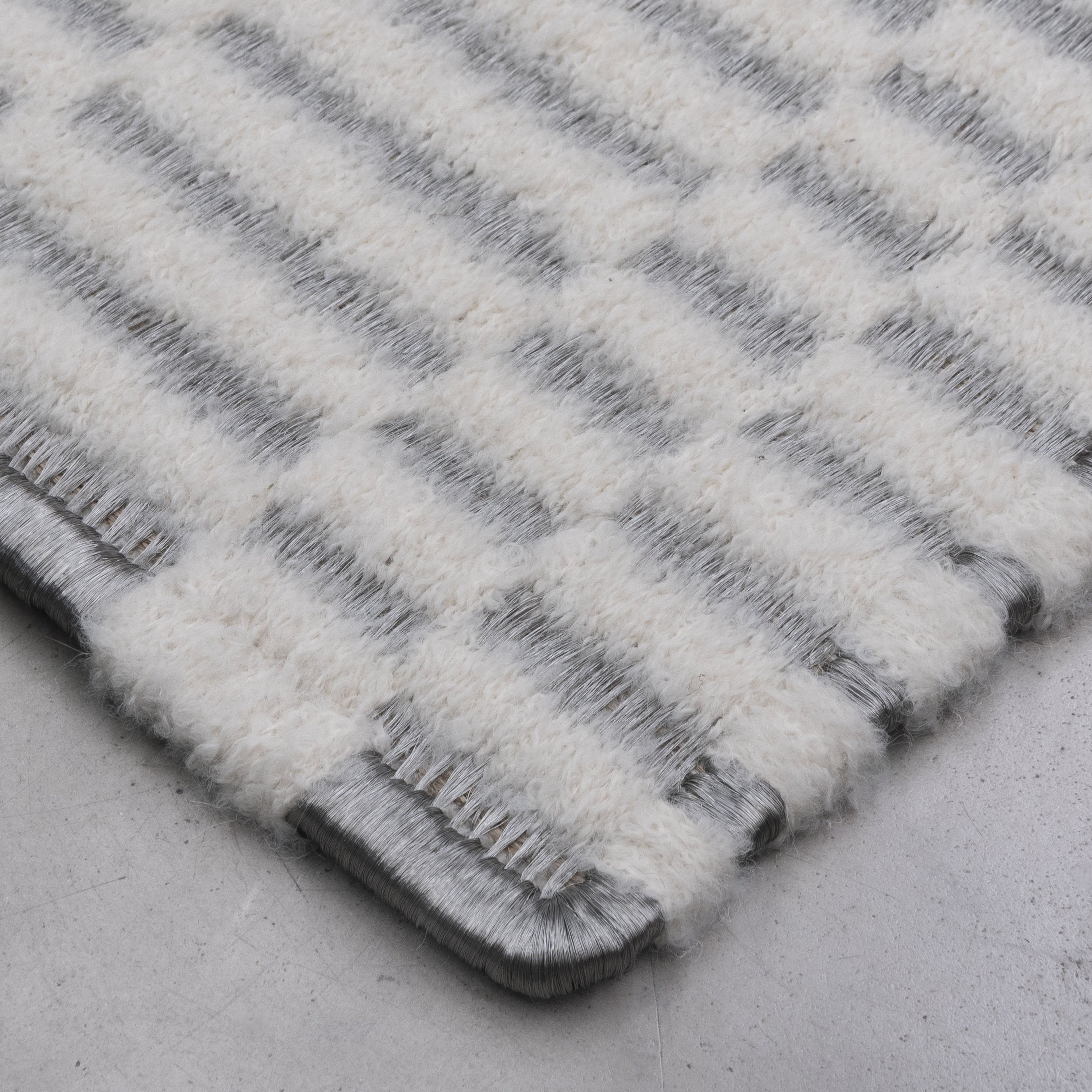 AXXIS WEAVE RUG IN STAINLESS STEEL AND BOUCLÉ ALPACA