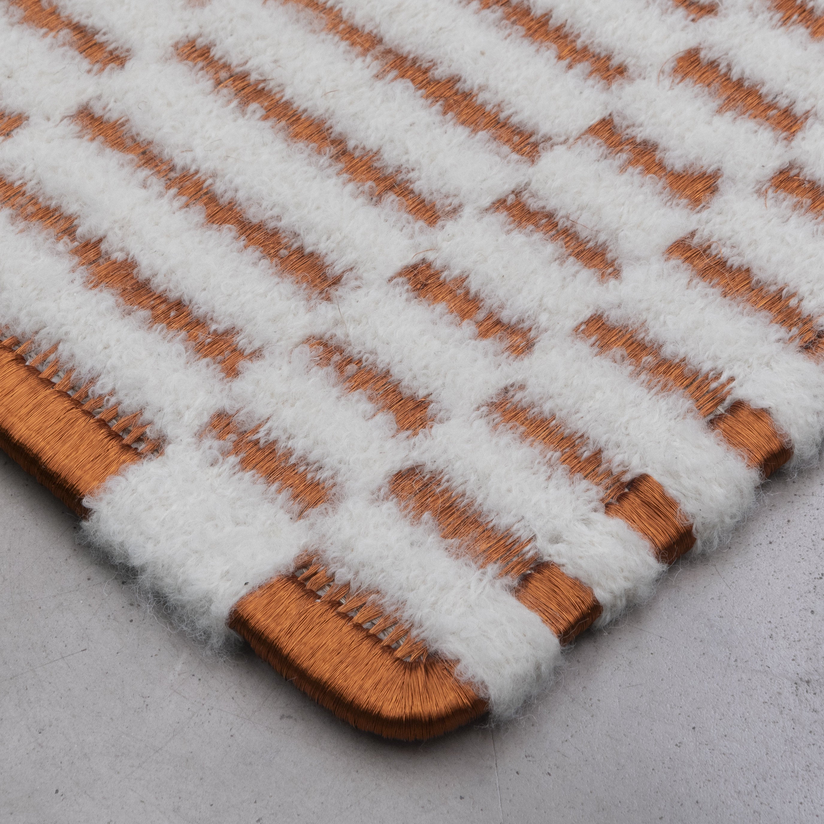 AXXIS WEAVE RUG IN COPPER AND BOUCLÉ ALPACA