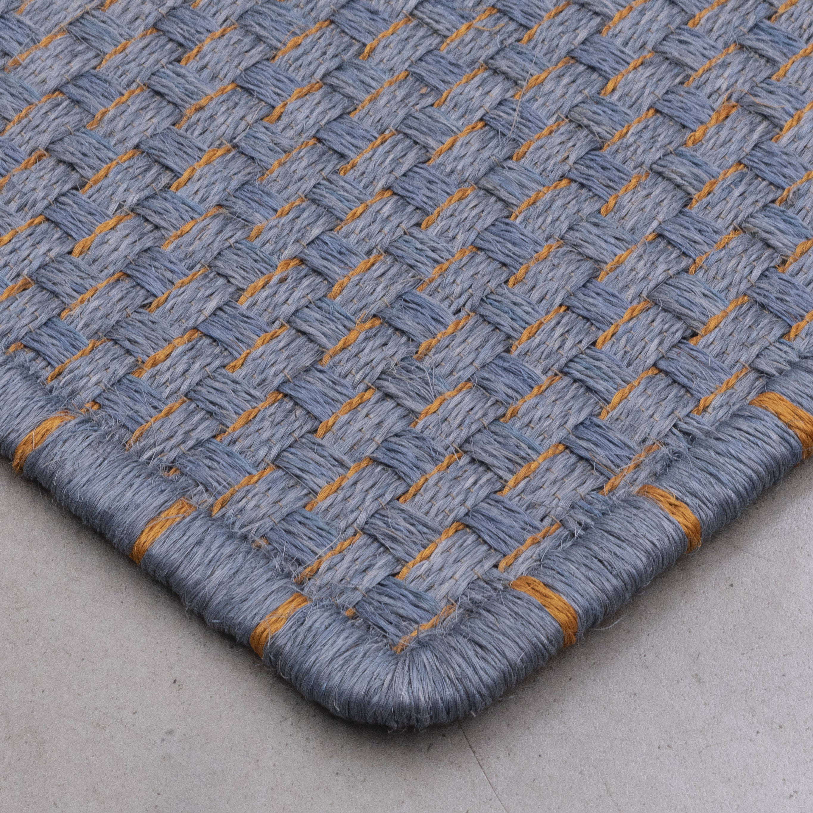 KANASPI WEAVE RUG IN CELESTE AND MUSTARD FIQUE FIBER