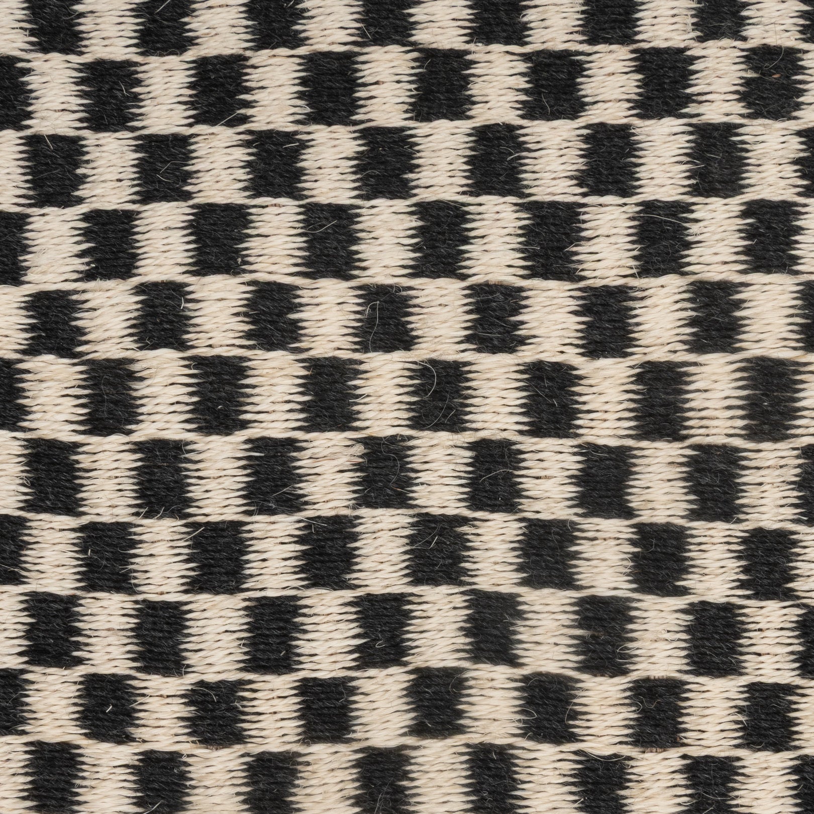 CHESS WEAVE RUG IN BLACK ALPACA AND WHITE FIQUE FIBER