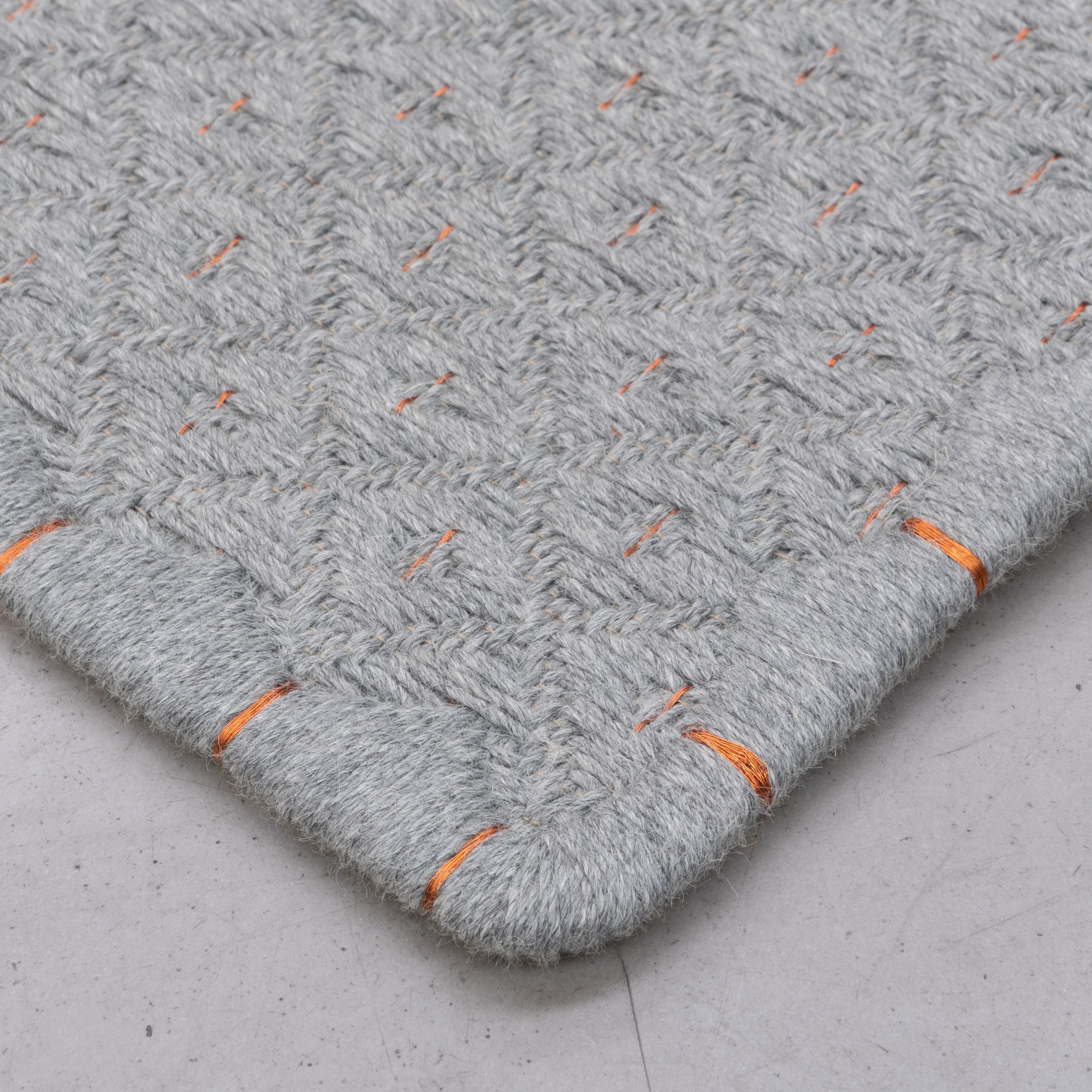 RHOMBUS WEAVE RUG IN GRAY ALPACA AND COPPER