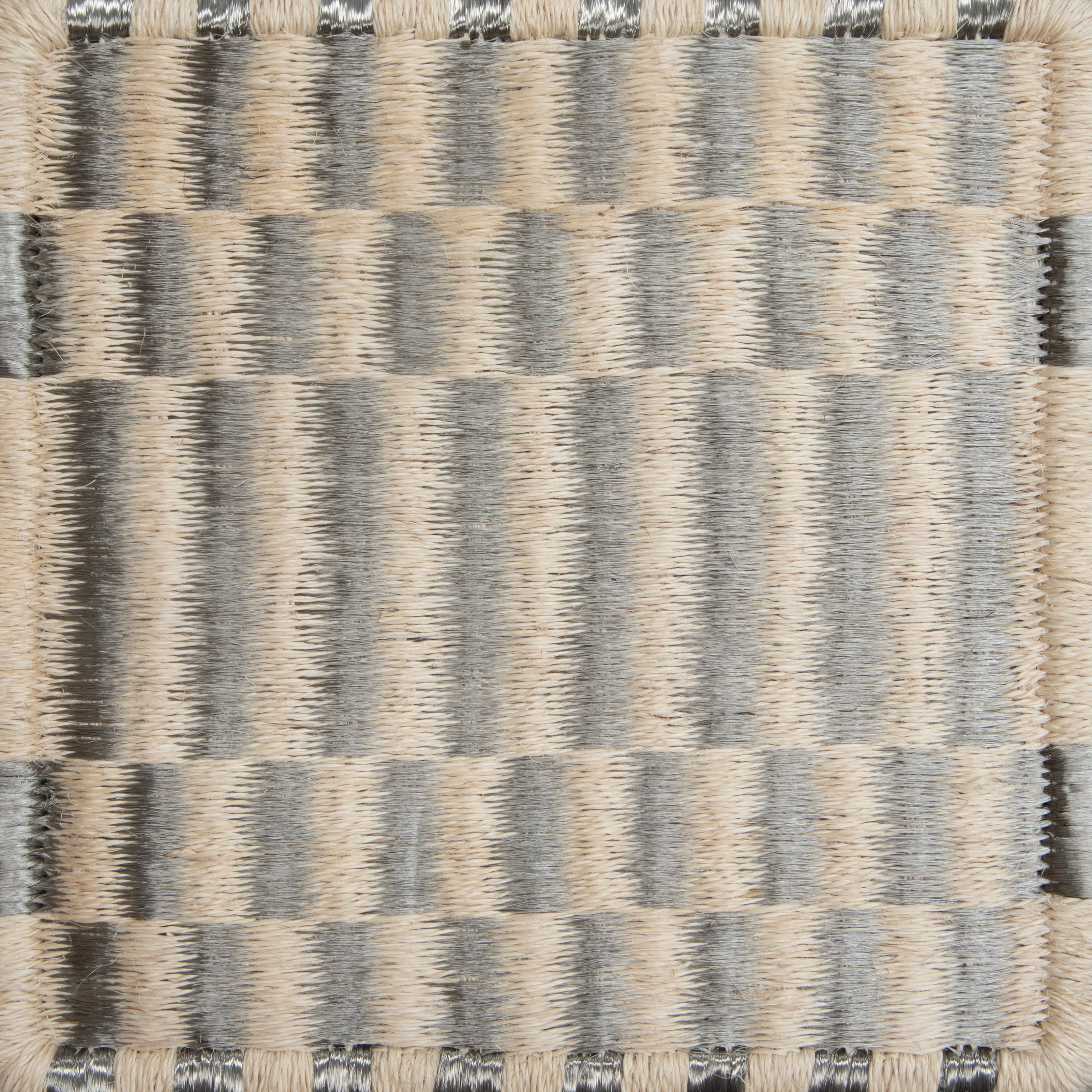 AXXIS WEAVE RUG IN WHITE FIQUE FIBER AND STAINLESS STEEL