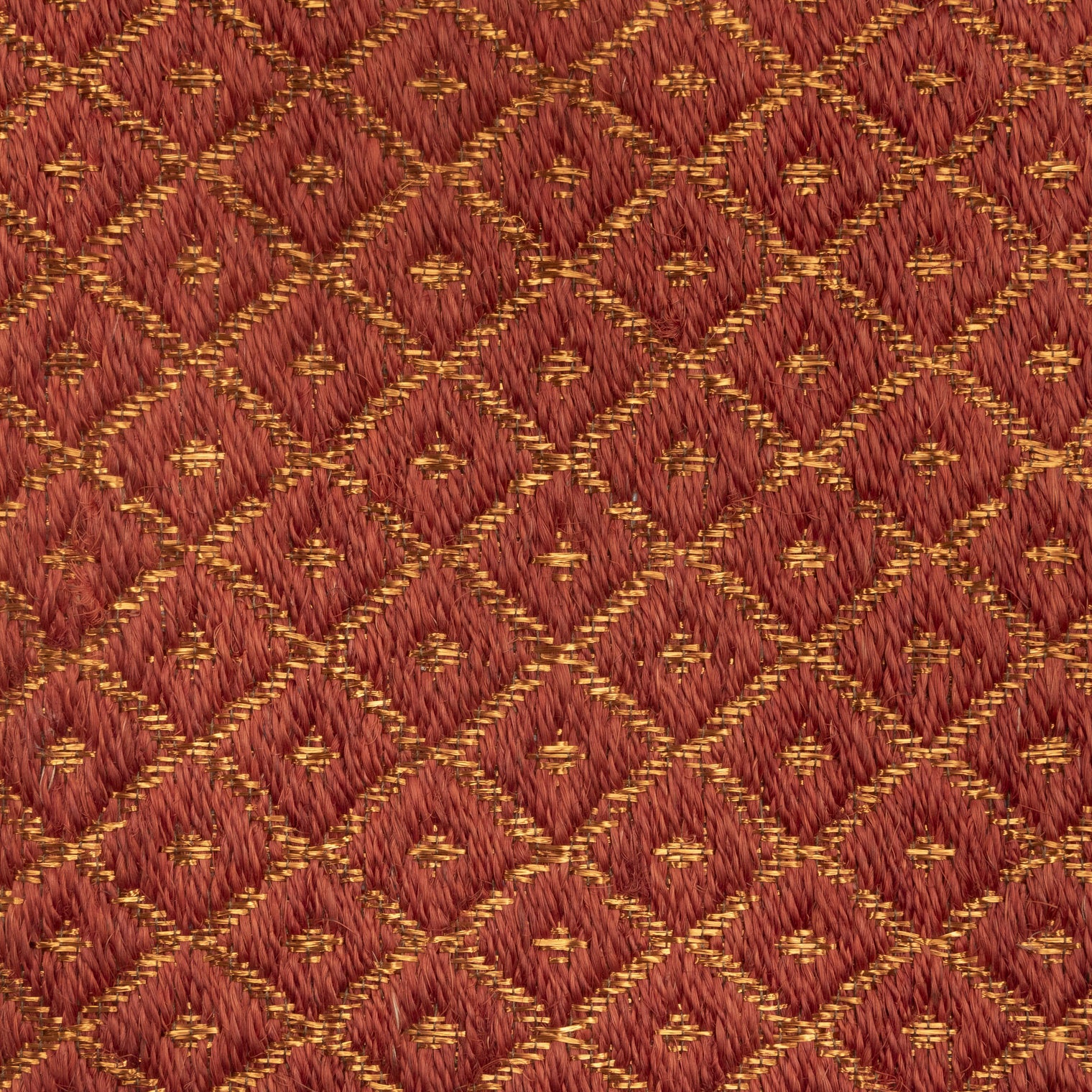 RHOMBUS WEAVE RUG IN BURGUNDY FIQUE FIBER AND COPPER